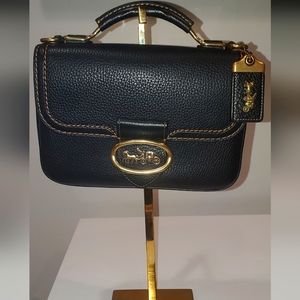 SOLD - Coach Riley 22